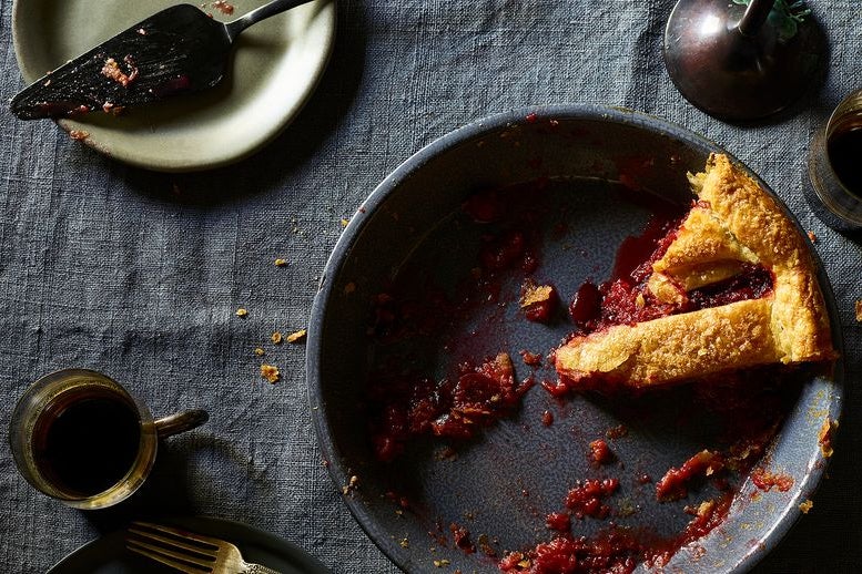 A slice of pie on a plate.
